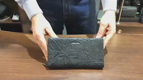 Мужской клатч Diesel из натуральной кожи.28 февраля 2021 г.